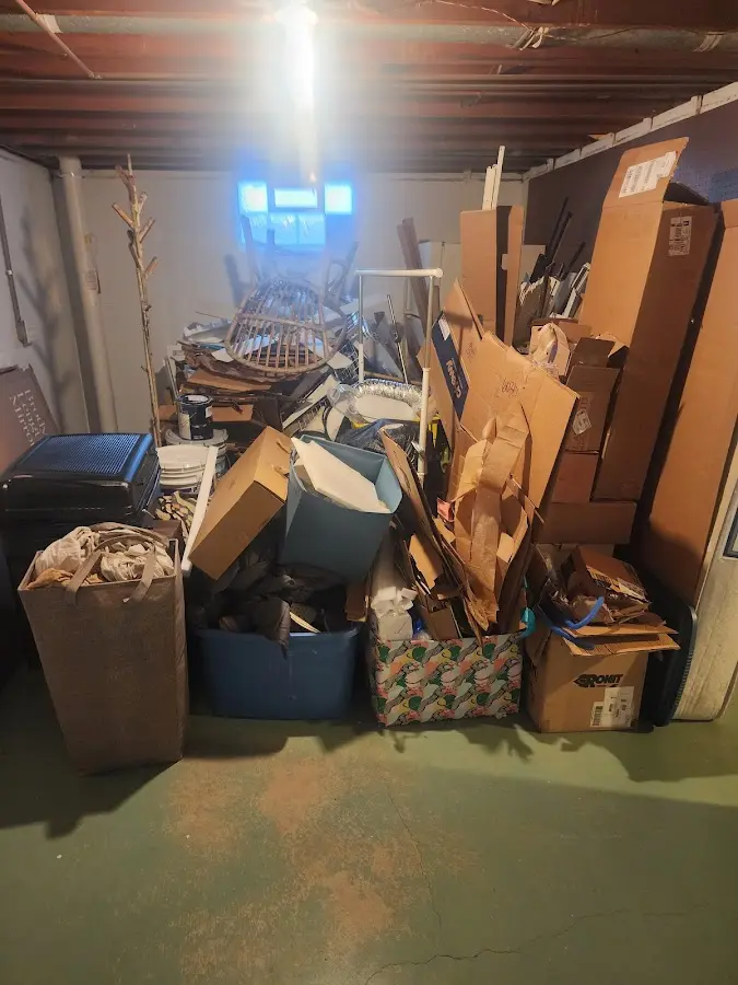 Roll-off dumpster container at job site for 6 Yard Dumpster Rental in Brandon